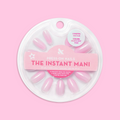 Iridescent Pink - Press-On | Medium | Oval showing medium oval false nails with soft pink iridescent finish in round packaging on pink background