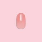 Pink Jelly - Press-On | Short | Round showing single sheer pink jelly false nail on pink background