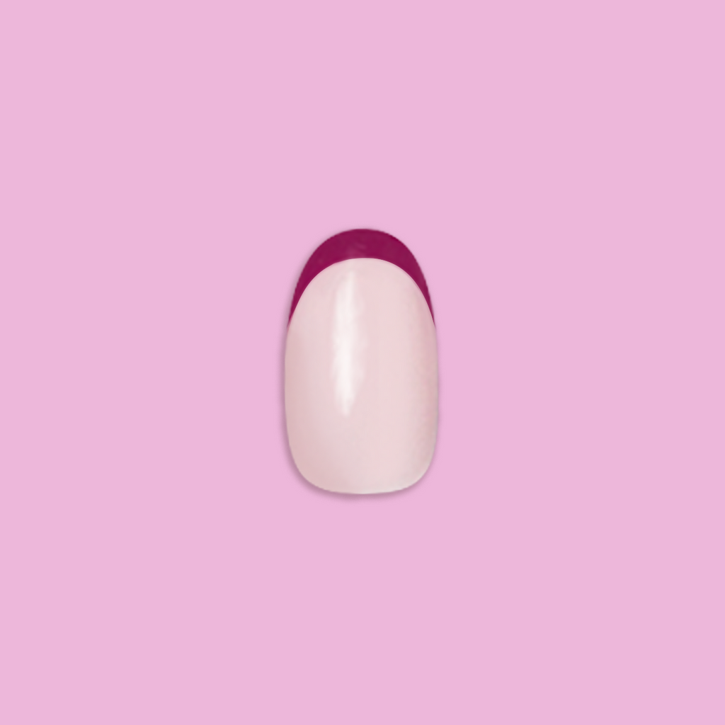 Plum Tonal French - Press-On | Short | Round showing single short round false nail with plum French tip on pink background