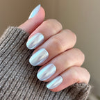 Sky Chrome - Press-On | Short | Round nails in shiny pale blue chrome finish for an easy at-home manicure look