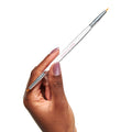 Hand holding the Nail Art Brush Set with fine brush tip for detailed at-home mani and nail polish designs thumbnail