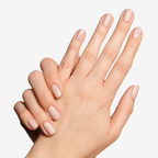 Hands with smooth nude manicure showing Long Lasting Top Coat for lasting shine and protection on nails