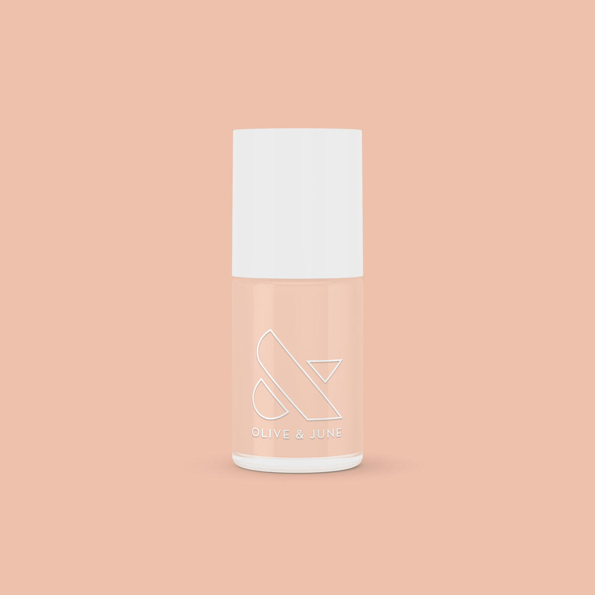 KAG nail polish bottle in neutral peachy pink shade on matching peach background for a fresh mani or pedi
