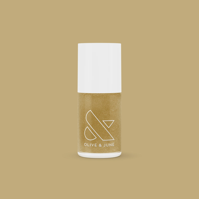 OJBH fifth image  Bottle of OJBH gel polish by Olive and June in shimmering 24-karat liquid gold for an easy at-home mani or pedi