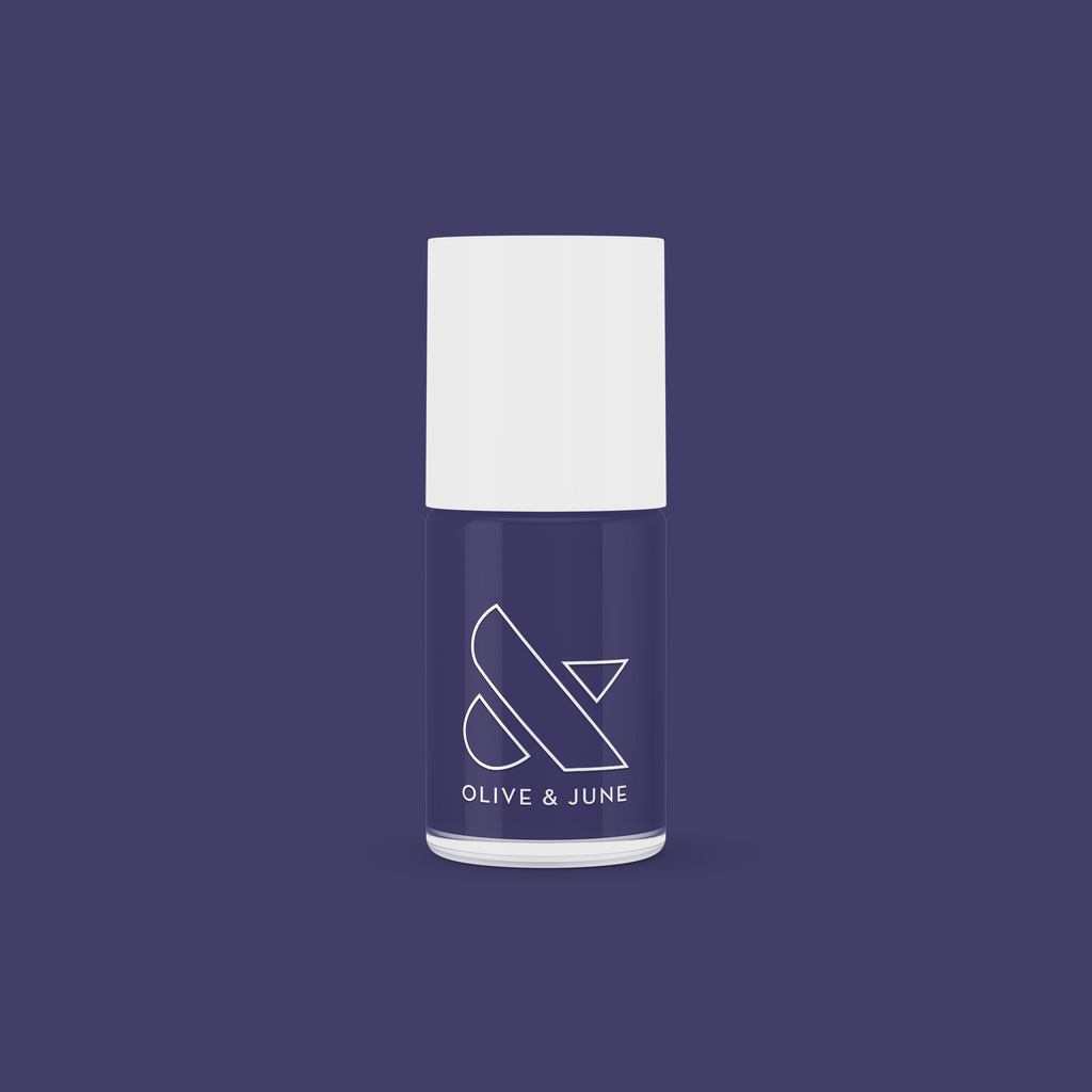 Olive and June OMG nail polish bottle in deep indigo shade for a smooth, long-lasting manicure at home