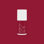 Olive and June’s SC nail polish bottle in rich deep bordeaux shade for sophisticated at-home manicures