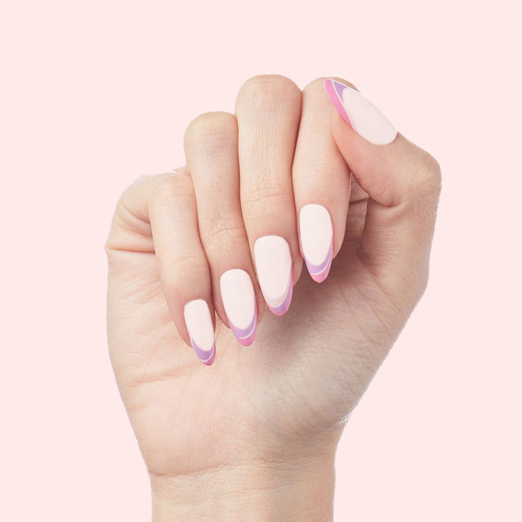 Twisted French - Press-On | Long | Almond showing hand with long almond false nails in soft pink with purple twist design manicure