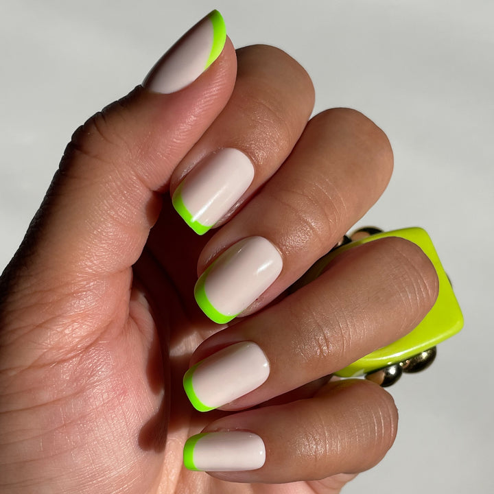 Gorgeous Nail Designs to Celebrate the Season : Bright Green Nails with  Black Tips