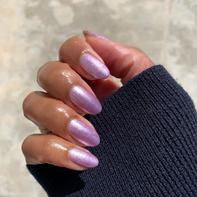 Lilac Shimmer polish on customer hand