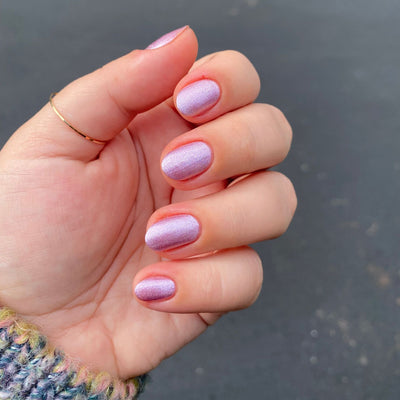 Lilac Shimmer polish on another customer hand