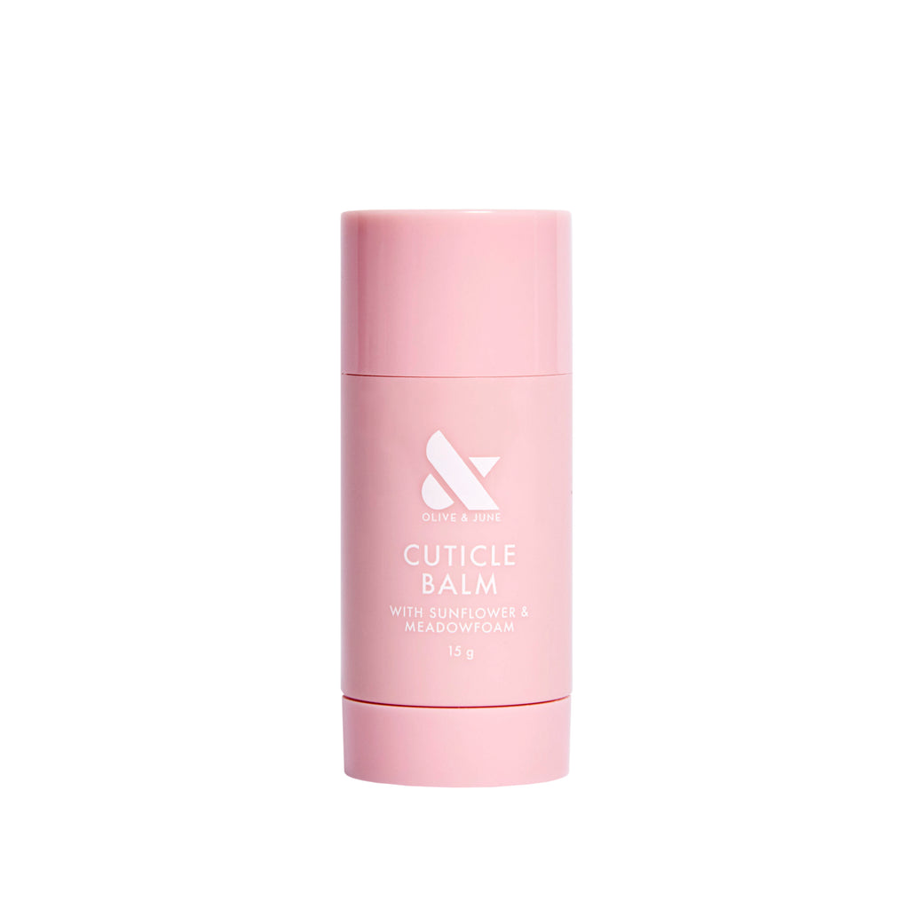 Cuticle Balm in a soft pink stick applicator for easy hydration of dry, cracked cuticles during at-home manicures