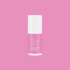 Bottle of Taffy quick dry gel polish in bright pink by Olive and June on a solid pink background