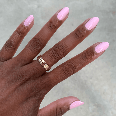 Rosy Tips polish on customer hand