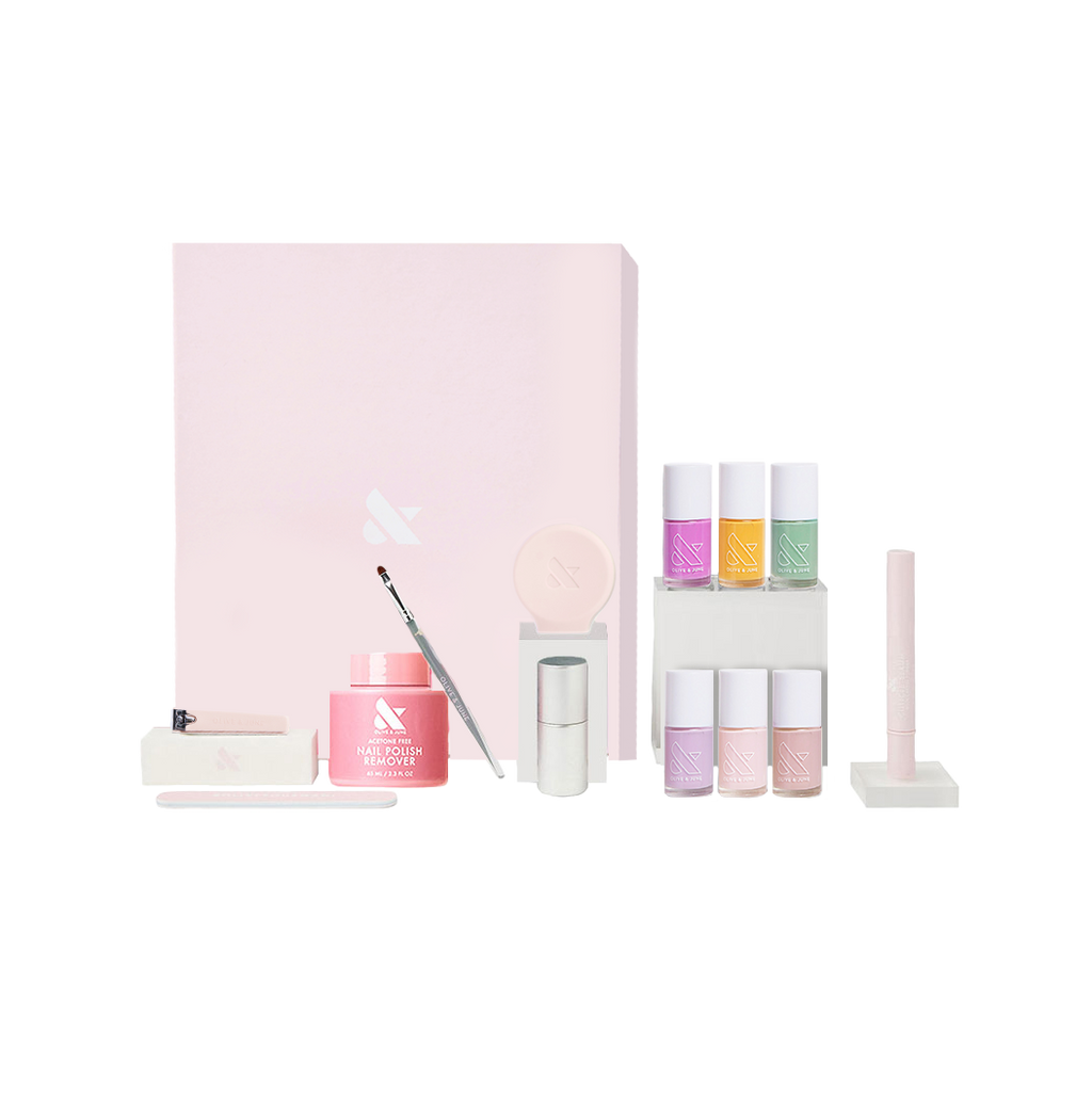 The Mani System nail care set with polish remover, brush, six polish shades, and tools for easy at-home manicures