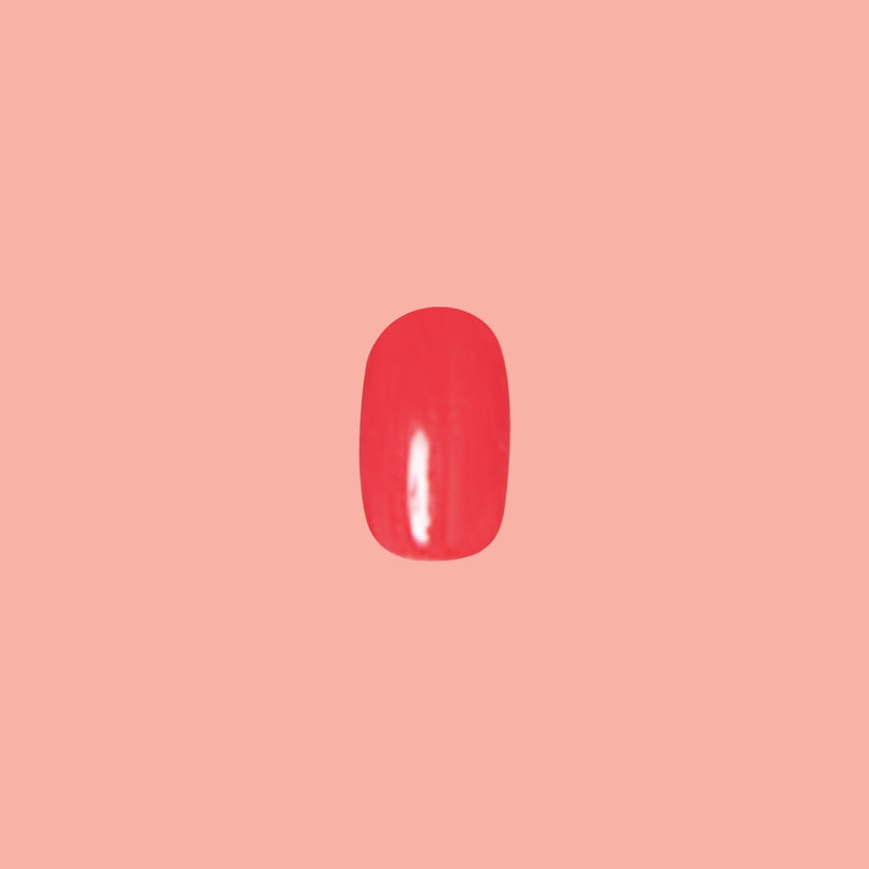 Field Day - Press-On | Short | Round featuring a short round false nail in vibrant watermelon red polish for a bright manicure