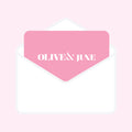 A digital gift card from Olive&June displayed in a pink envelope graphic with the brand's logo.