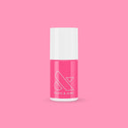 Olive and June Hot Strawberry gel polish bottle in bright strawberry pink against a matching pink background