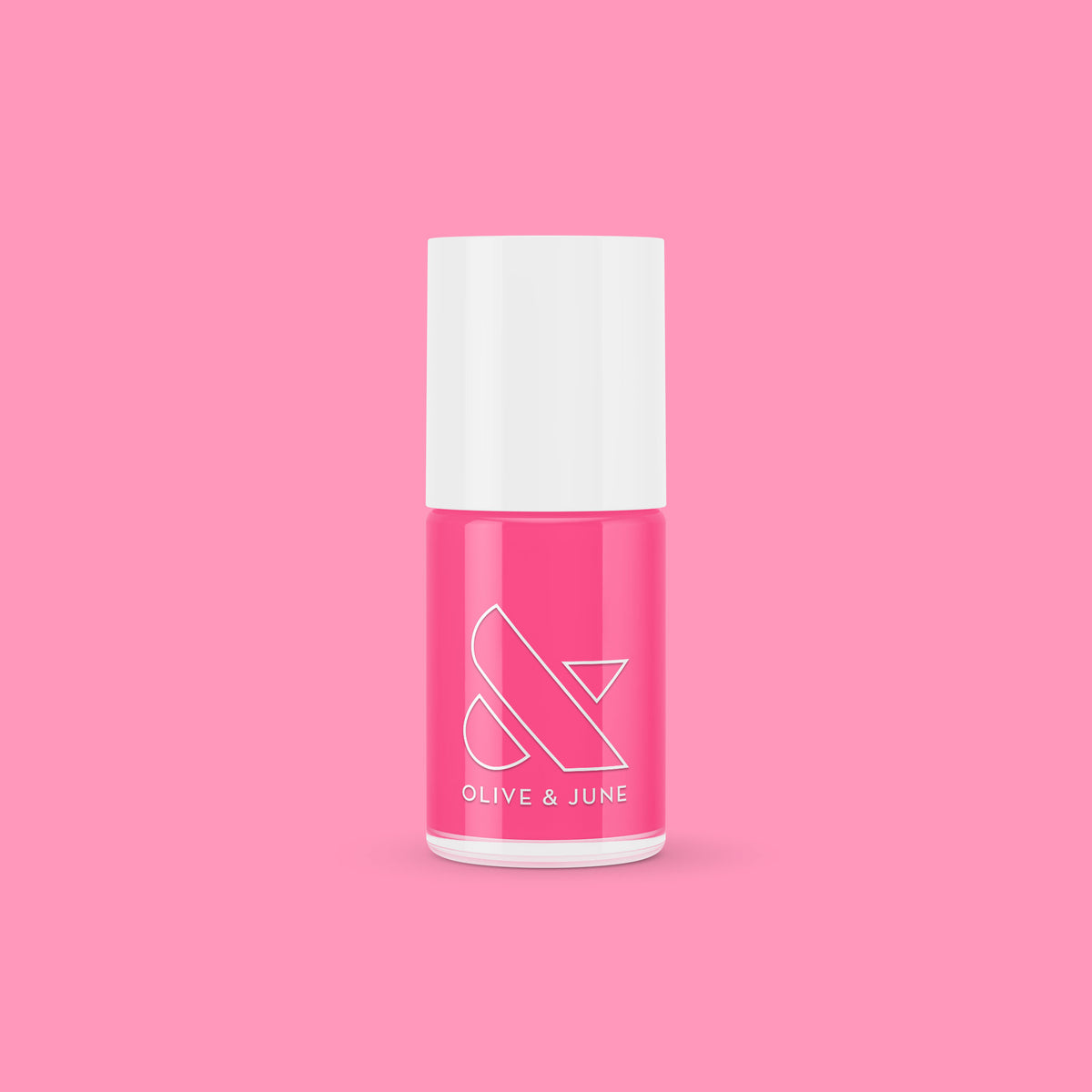 Olive and June Hot Strawberry gel polish bottle in bright strawberry pink against a matching pink background