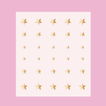 Sheet of gold Stars nail art stickers in varying sizes for mani and manicure decoration with the Stars design thumbnail